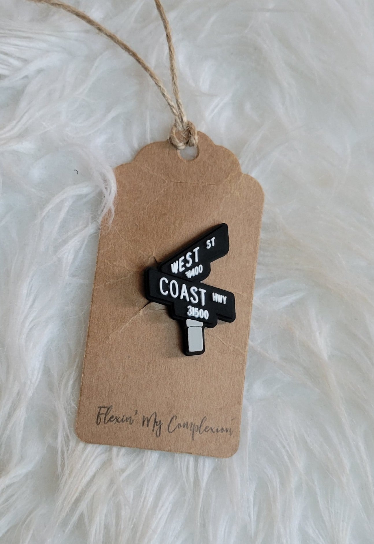 West Coast Street Sign